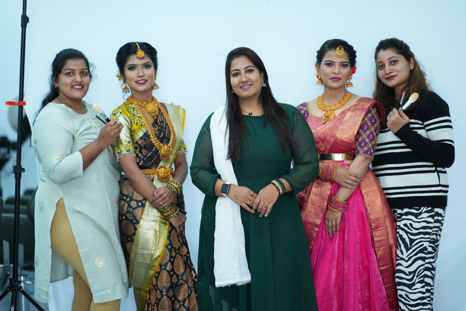 Group photo of Ranjitha with students and models