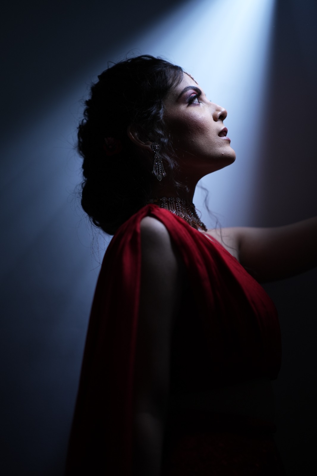 Dramatic bridal pose with spotlight
