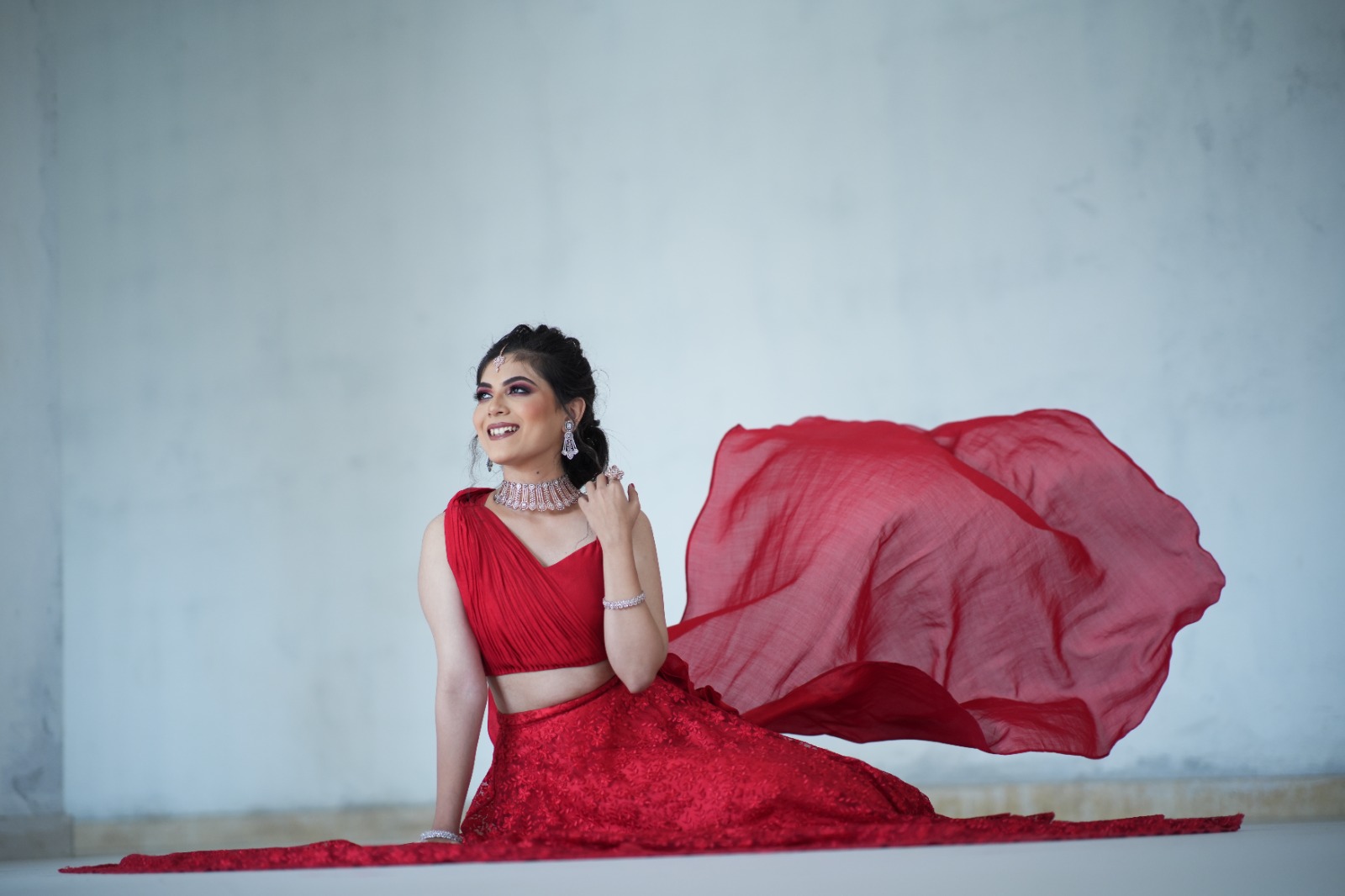 Red flowing outfit bridal shoot