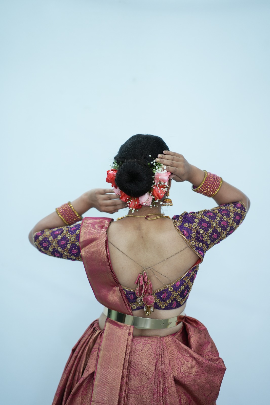 Traditional bridal bun hairstyle from back